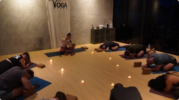 A candlelit Deep Recovery Extended class
